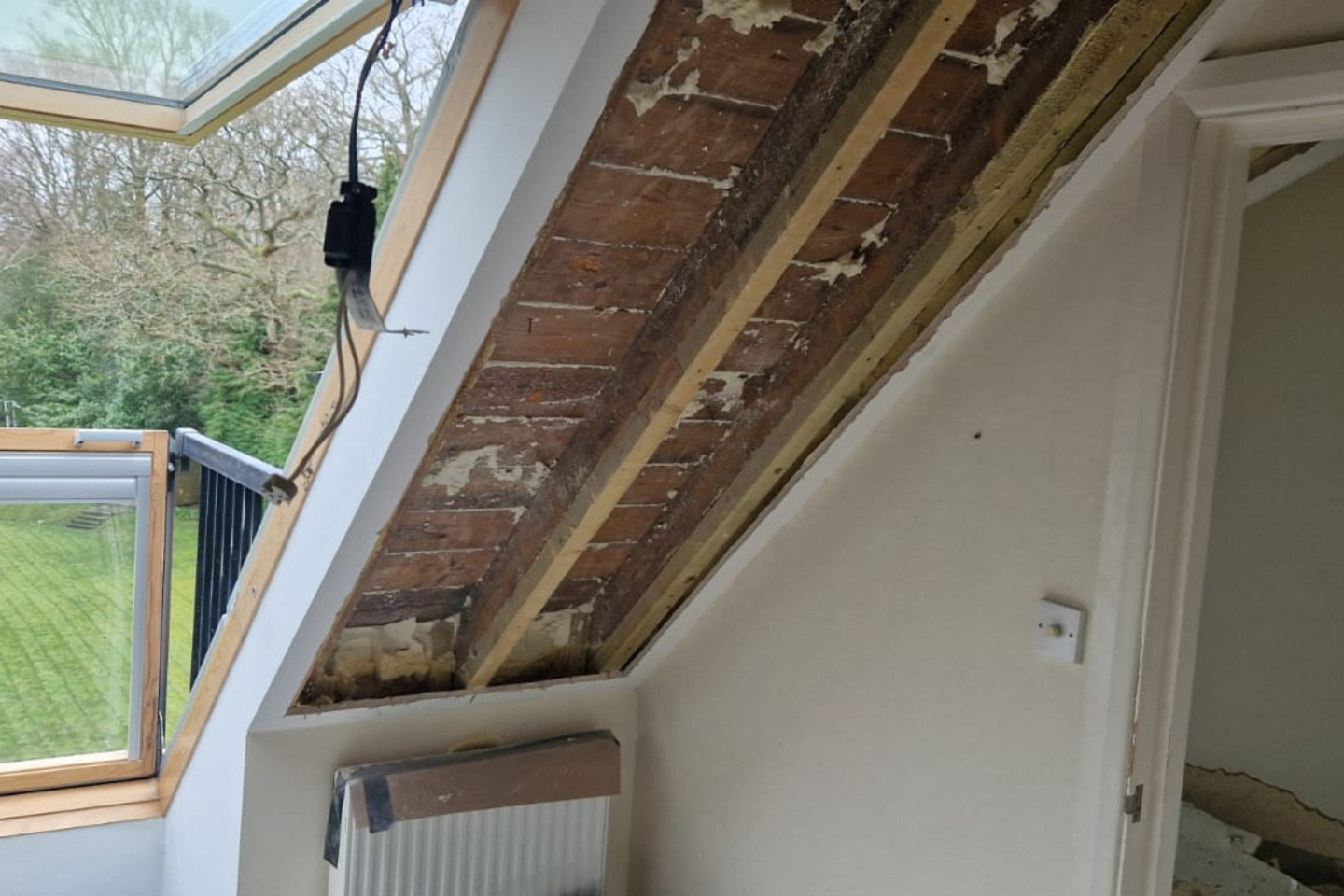 Spray foam removed from behind a loft conversion